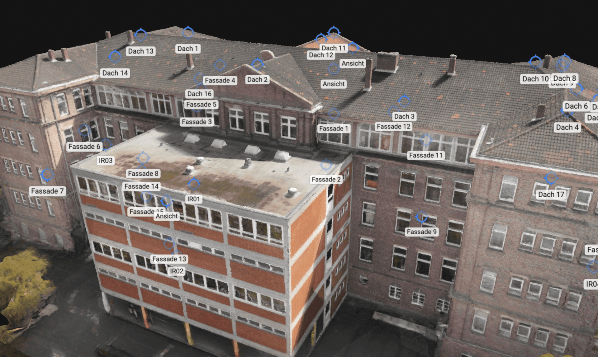 Aerial view of a building with multiple labels indicating various roof and facade sections.