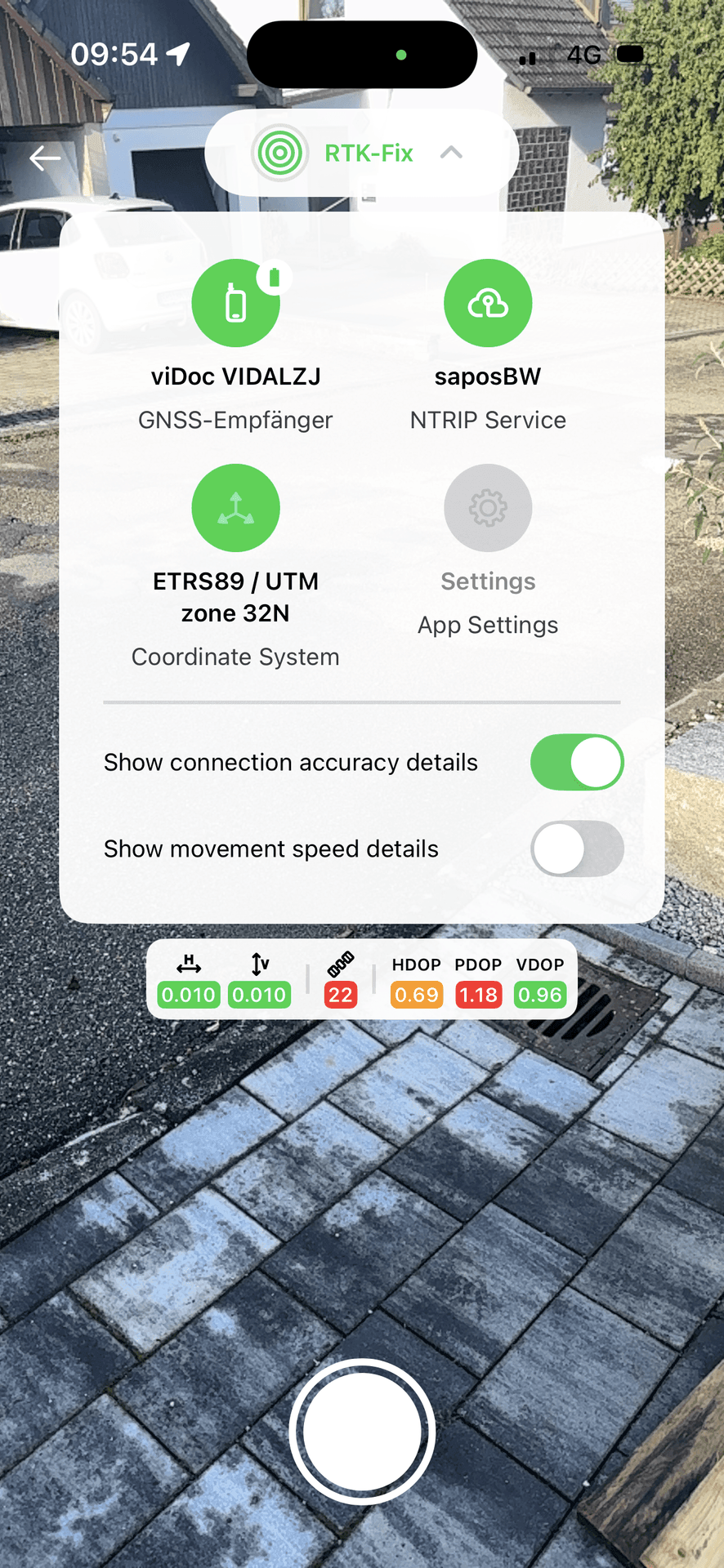 Smartphone interface displaying GNSS settings and connectivity details overlaid on a pavement background.