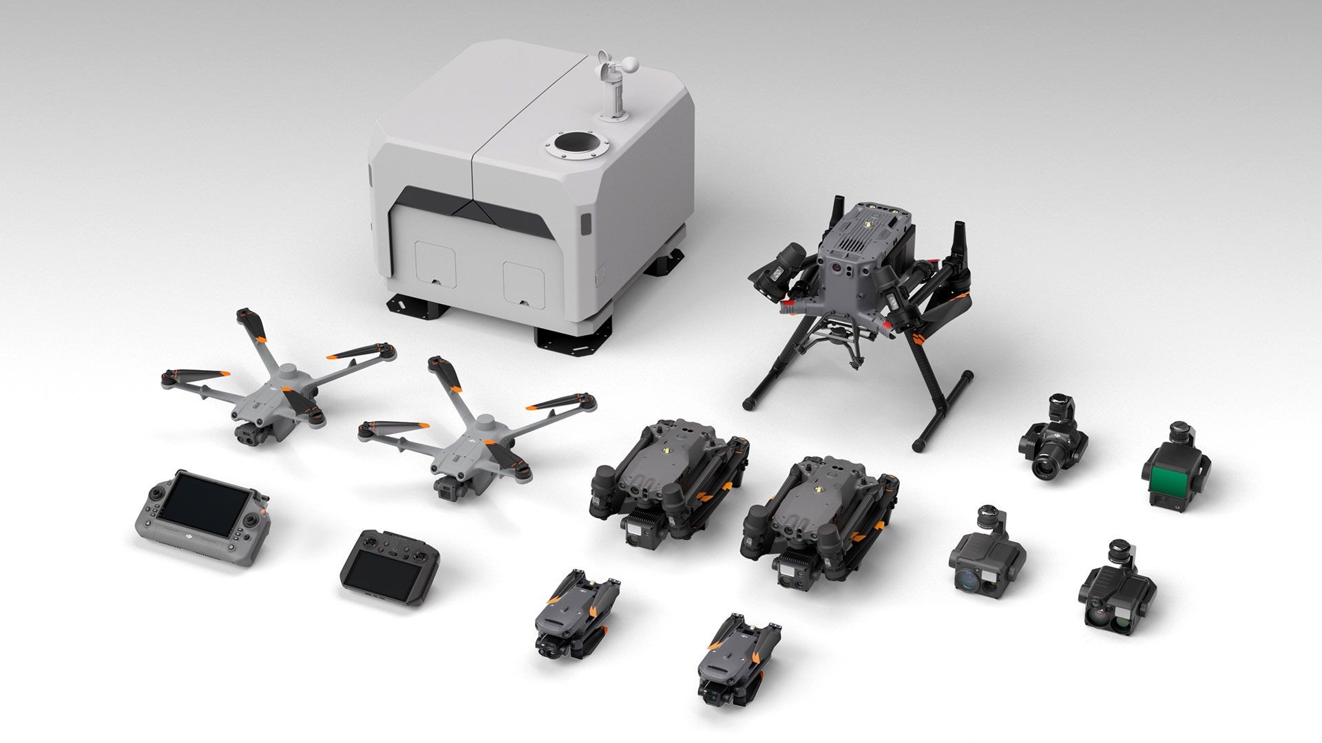 Collection of drones, remote controllers, and camera modules displayed on a white background.